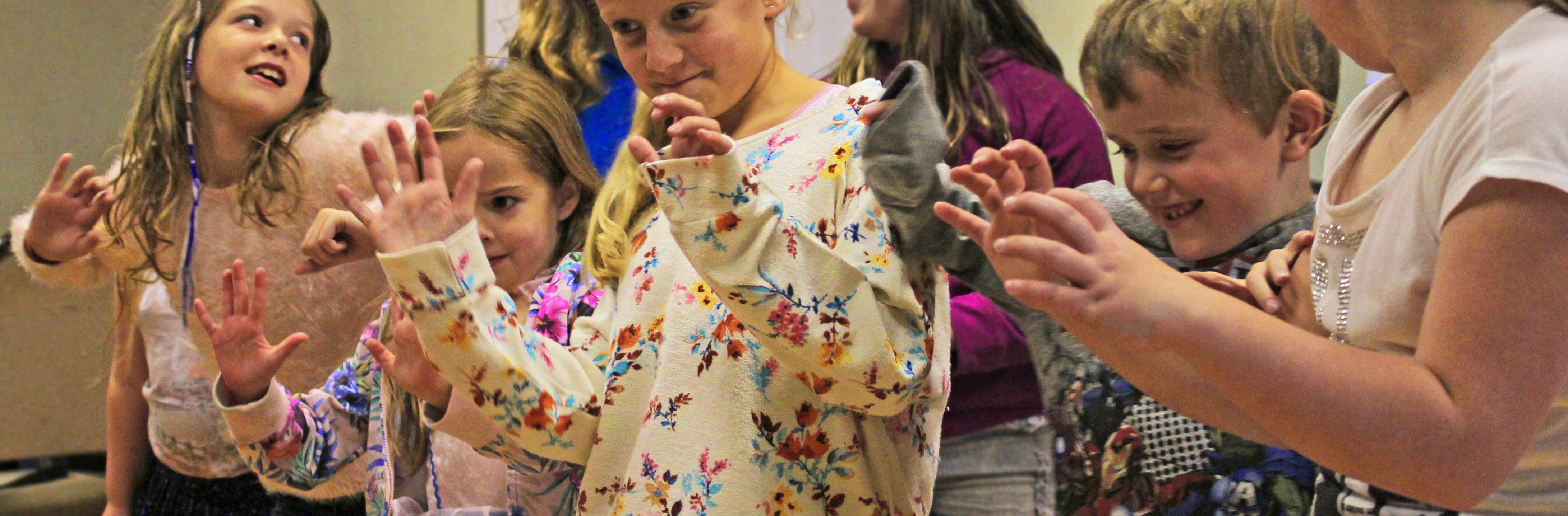 Some children join in with the storytelling through movement